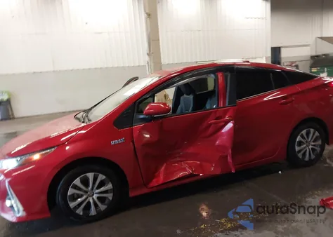 2021 Toyota Prius Prime Limited z USA, uszkodzony, nr VIN JTDKAMFP9M3184313